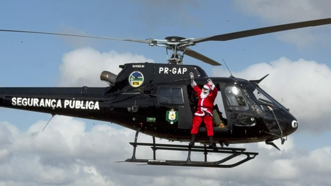 Papai Noel encantou crianças e adultos ao descer no helicóptero do GTA